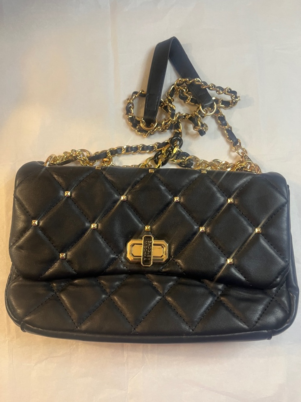 BADGLEY MISCHKABlack Quilted Shoulder Bag with Gold Chain.